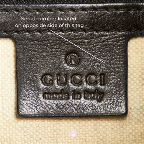 what does the leather label on gucci jeans look like|Gucci bag serial number look.